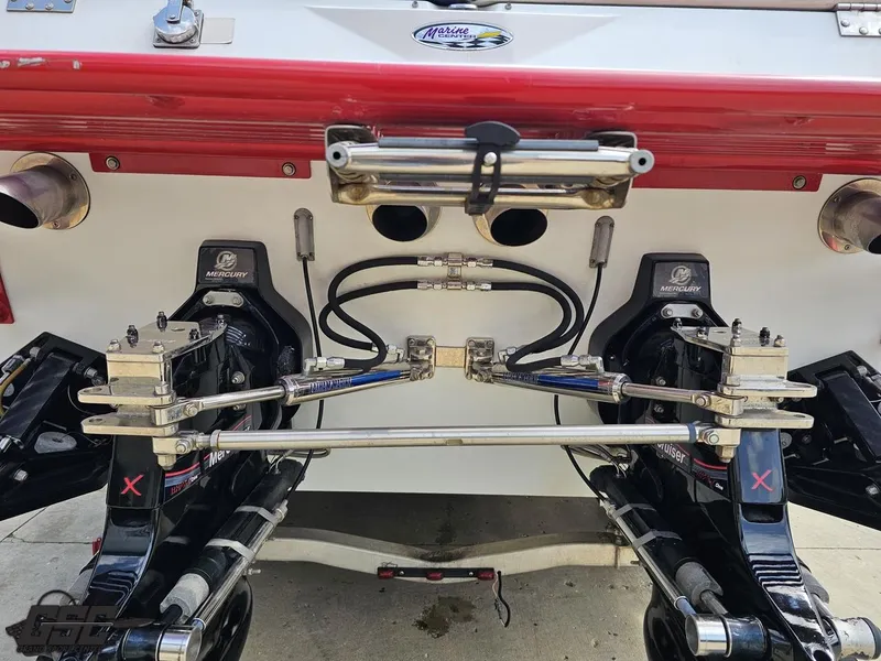 Slide: The Image of Rear view of 2007 Baja 35 Outlaw boat with Mercury outdrives and hydraulic steering. - 30