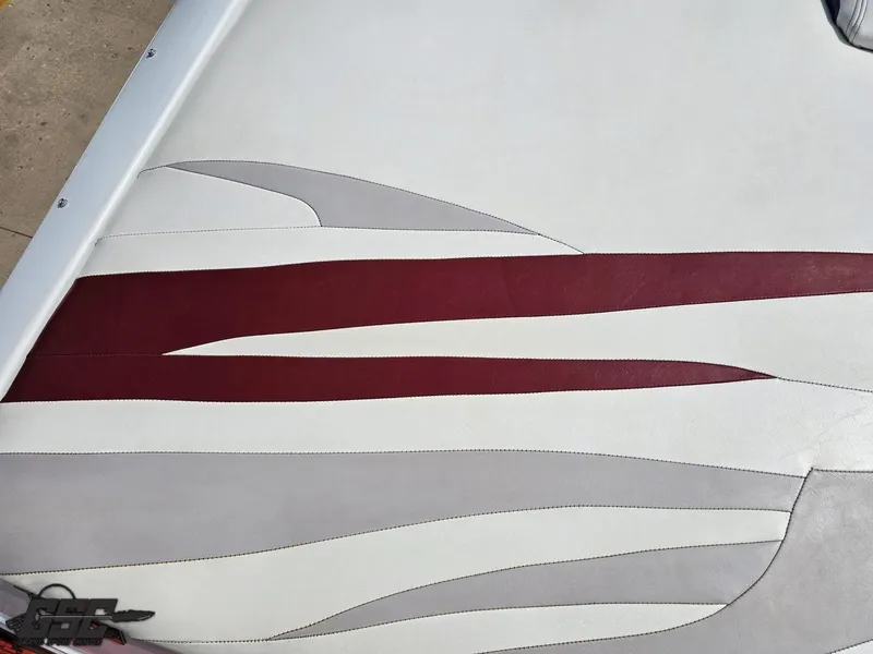 Slide: The Image of 2007 Baja 35 Outlaw boat upholstery with red and gray accents. - 38