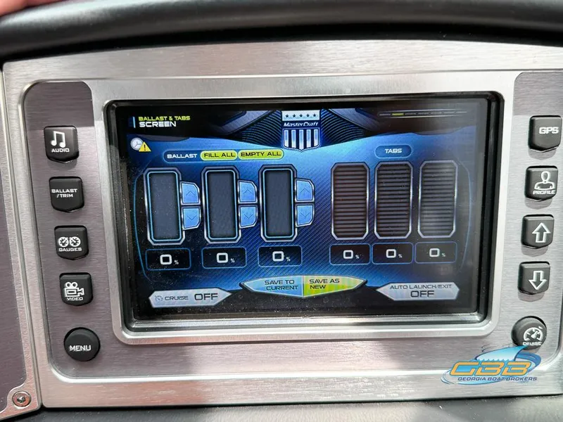 Slide: The Image of 2017 MasterCraft XT20 control panel displaying ballast and tabs settings. - 20