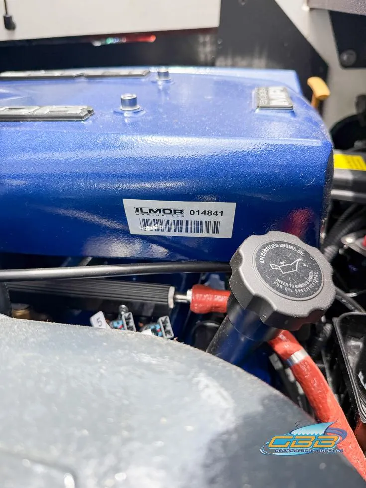 Slide: The Image of Close-up of 2017 MasterCraft XT20 engine with Ilmor label and oil cap. - 25