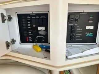 Slide: The Image of Electrical panel inside a 2000 Sea Ray 310 Sundancer boat. - 10