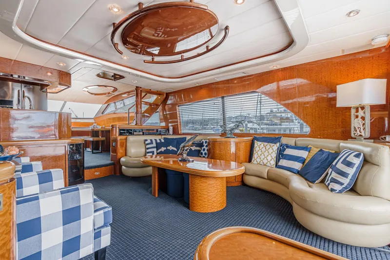 Slide: The Image of Luxurious interior of a 1999 Horizon 70 Motor Yacht with elegant seating and decor. - 29