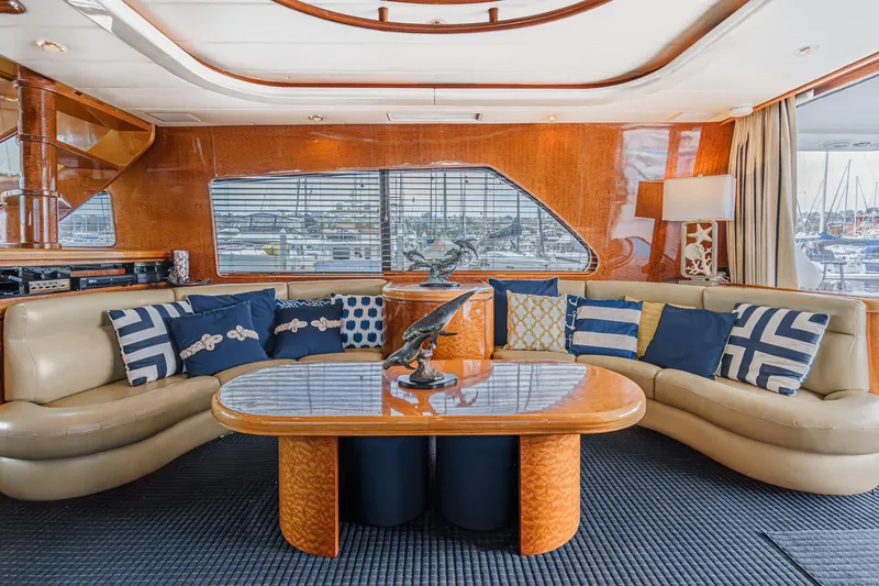 Slide: The Image of Luxurious interior of a 1999 Horizon 70 Motor Yacht with elegant seating and nautical decor. - 30