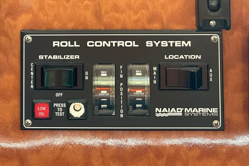 Slide: The Image of Control panel of Naiad Marine Systems roll control on 1999 Horizon 70 Motor Yacht. - 48