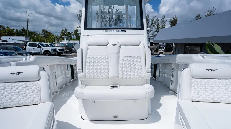Slide: The Image of 2026 Tidewater 282CC Adventure boat with luxurious white seating and modern design. - 25