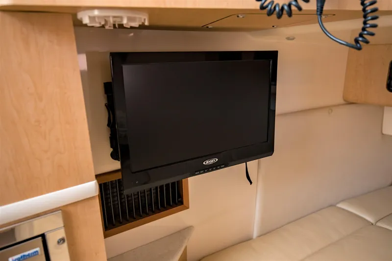 Slide: The Image of Flat-screen TV in 2014 Boston Whaler 370 Outrage cabin interior. - 21