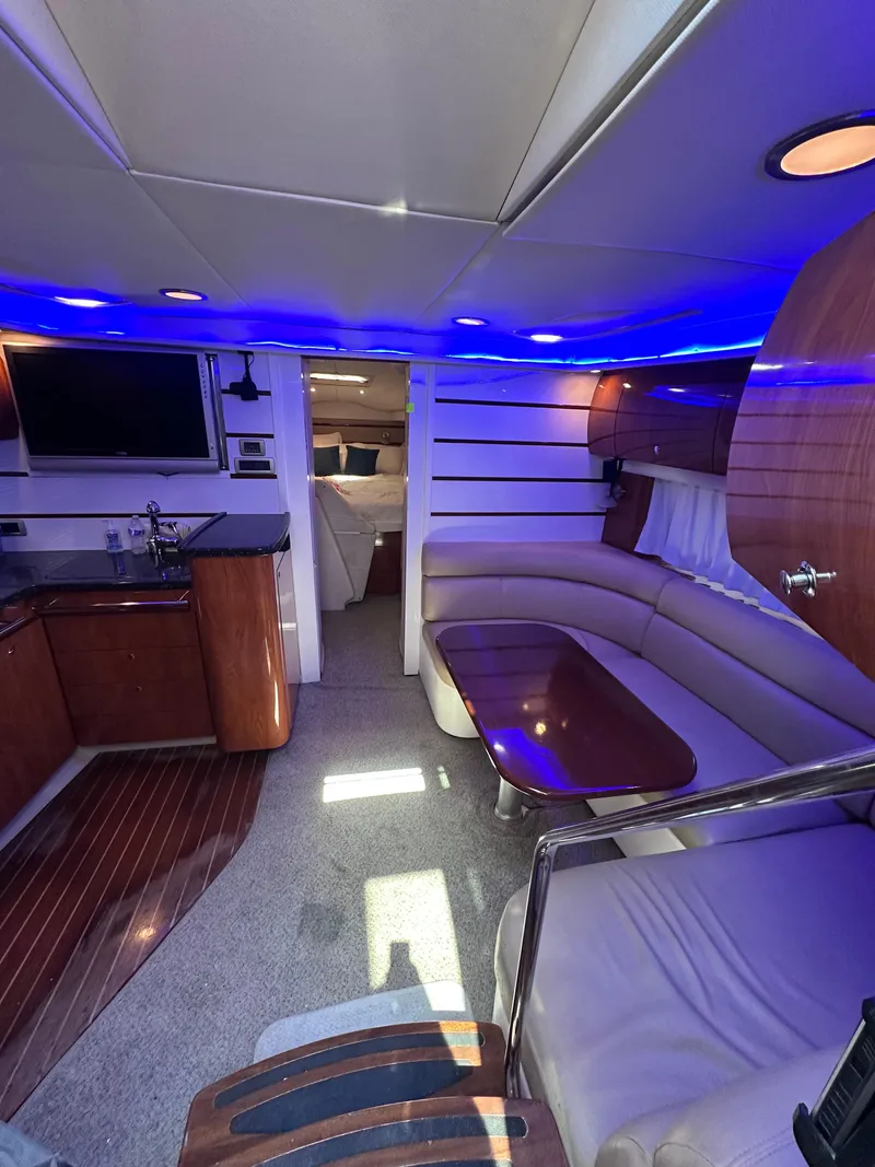 Slide: The Image of Luxurious 2008 Four Winns V458 yacht interior with modern seating and ambient lighting. - 15