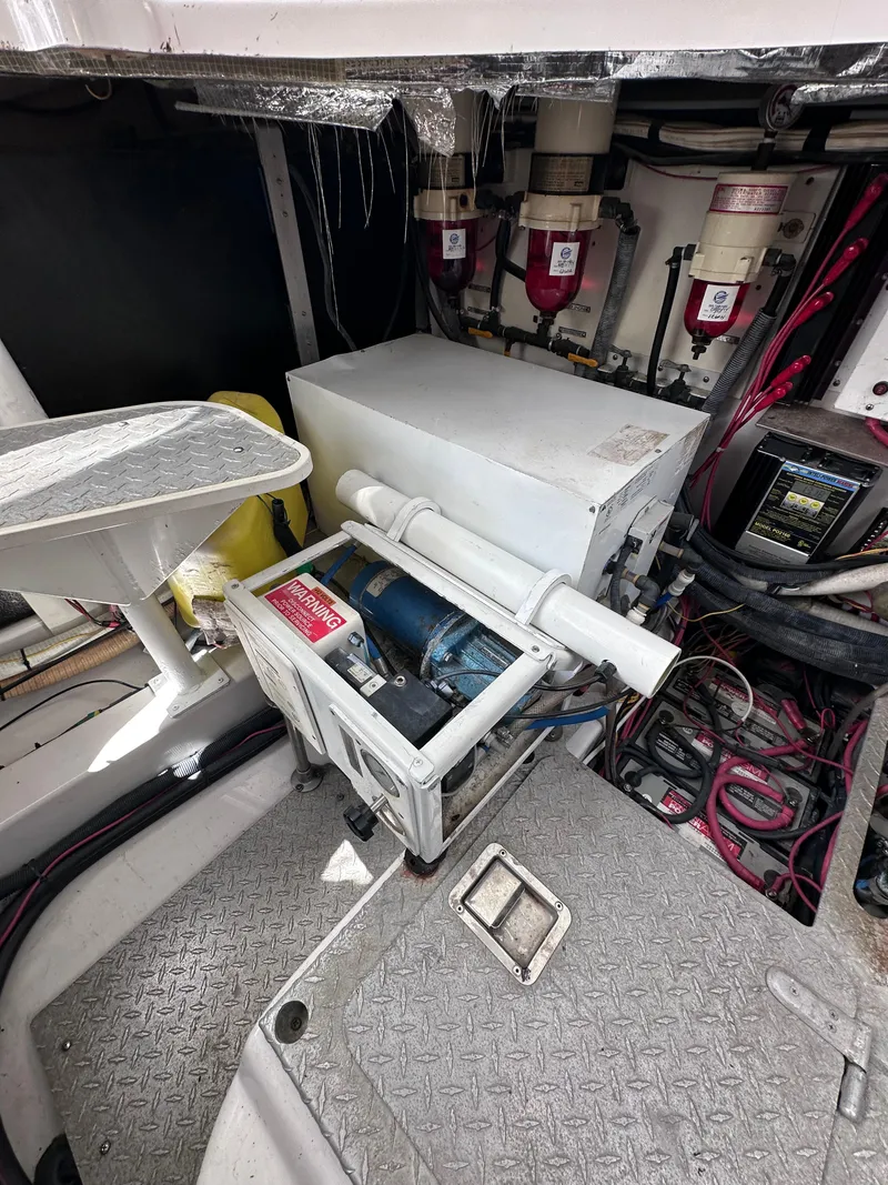Slide: The Image of Engine room of 2008 Four Winns V458 boat, showing machinery and wiring. - 40
