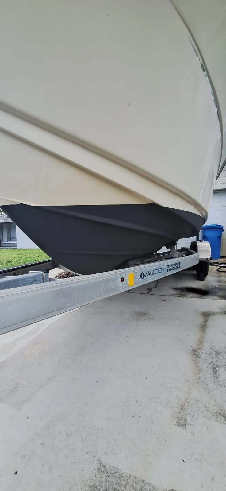 Slide: The Image of 2022 Scout 215 XSF boat on trailer, close-up view of hull and trailer. - 3