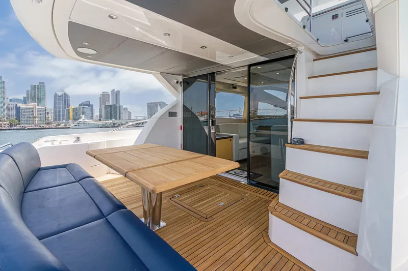 Slide: The Image of Luxurious Sunseeker Manhattan 65 yacht deck with city skyline view, 2017 model. - 10