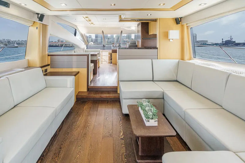 Slide: The Image of Luxurious interior of 2017 Sunseeker Manhattan 65 yacht with elegant seating and wooden flooring. - 13