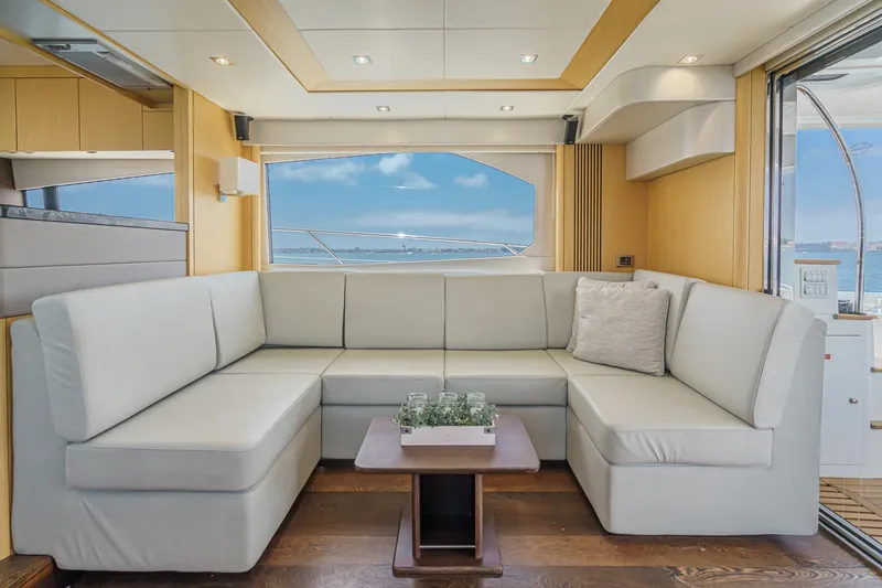 Slide: The Image of Luxurious interior of 2017 Sunseeker Manhattan 65 yacht with elegant seating and ocean view. - 15