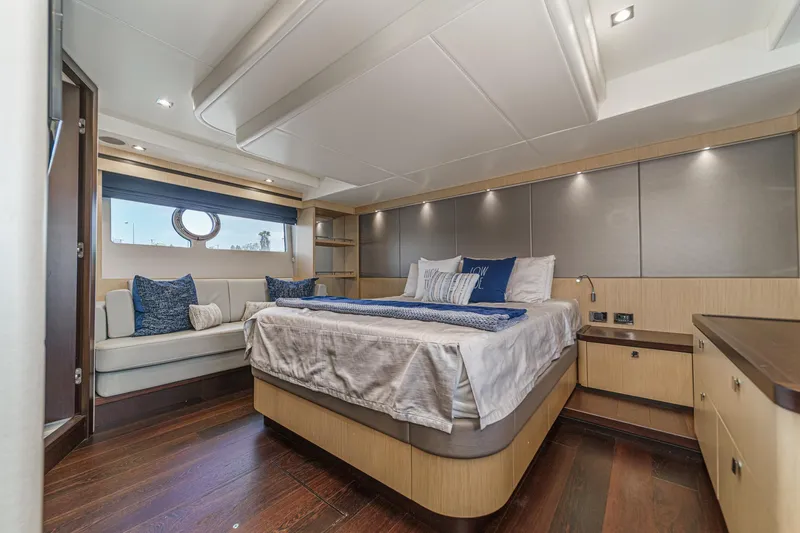 Slide: The Image of Luxurious bedroom interior of 2017 Sunseeker Manhattan 65 yacht with modern design and cozy seating. - 33