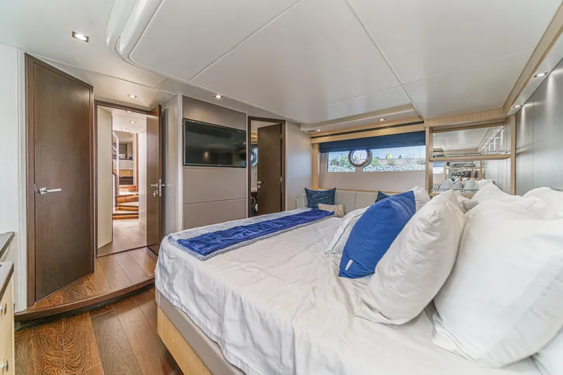 Slide: The Image of Luxurious bedroom interior of 2017 Sunseeker Manhattan 65 yacht with modern decor. - 35