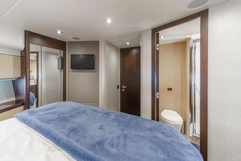 Slide: The Image of Luxurious bedroom interior of 2017 Sunseeker Manhattan 65 yacht with modern amenities. - 40