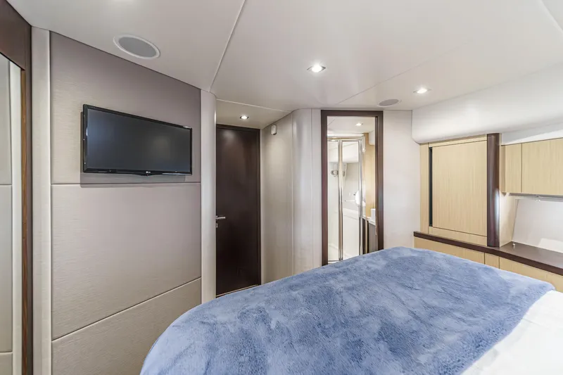 Slide: The Image of Luxurious bedroom interior of 2017 Sunseeker Manhattan 65 yacht with modern amenities. - 41