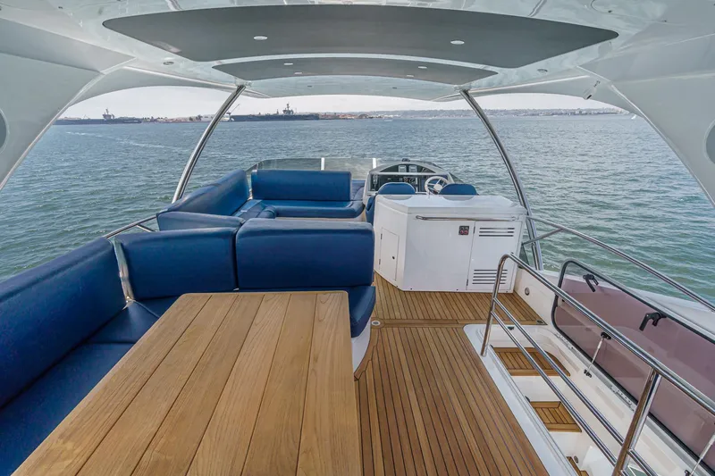 Slide: The Image of Luxurious 2017 Sunseeker Manhattan 65 yacht with spacious deck and elegant seating. - 46