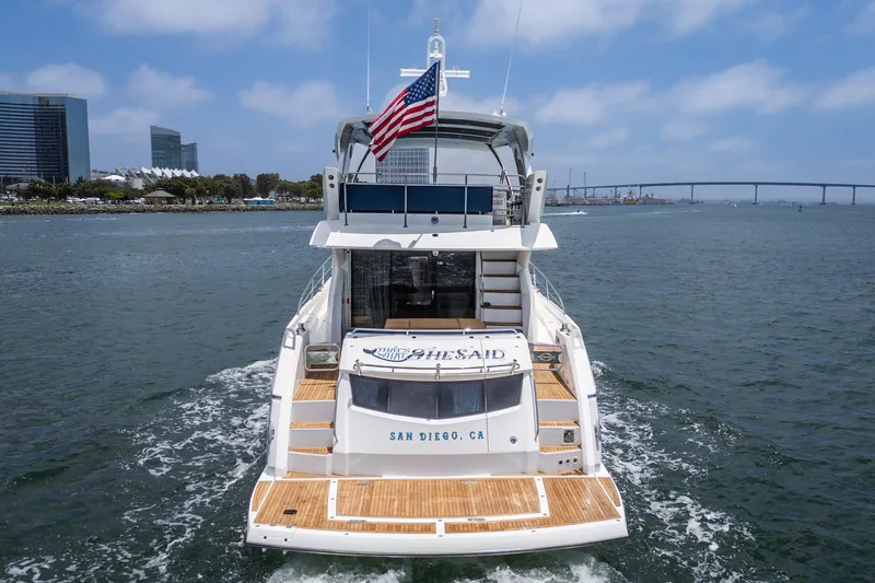 Slide: The Image of 2017 Sunseeker Manhattan 65 yacht cruising in San Diego waters, rear view. - 8