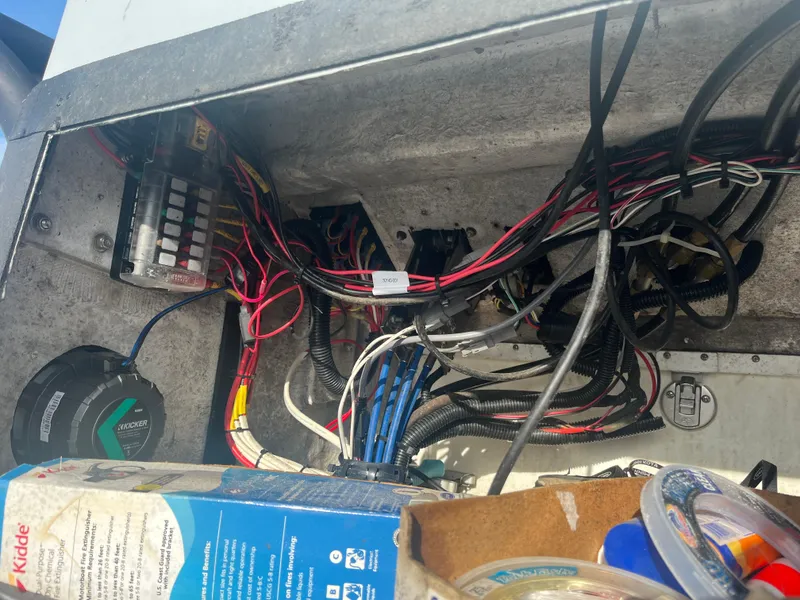 Slide: The Image of Electrical wiring and components inside a 1971 Aquasport 222 boat. - 18