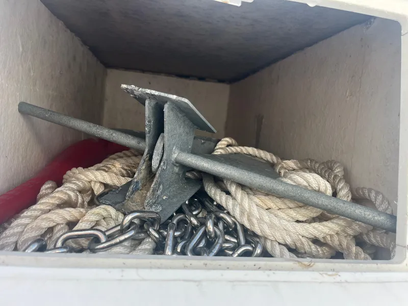 Slide: The Image of Anchor and rope storage in 1971 Aquasport 222 boat compartment. - 21