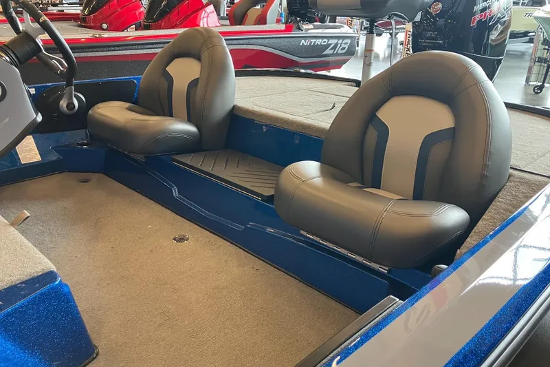 Slide: The Image of Interior of a 2025 Nitro Z17 boat featuring comfortable seating and modern design. - 6