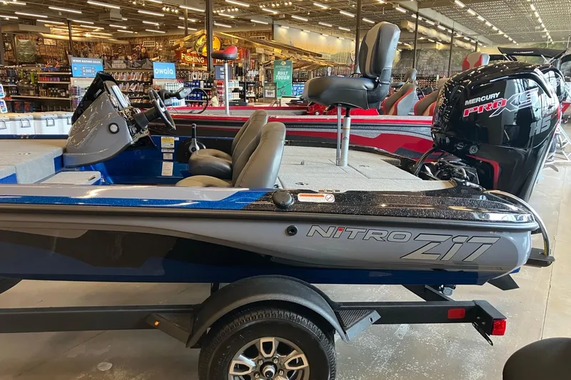Slide: The Image of 2025 Nitro Z17 boat with Mercury engine displayed in a showroom. - 2