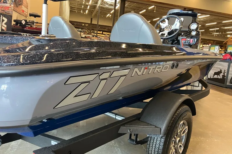 Slide: The Image of 2025 Nitro Z17 boat on display in showroom, showcasing sleek design and modern features. - 1