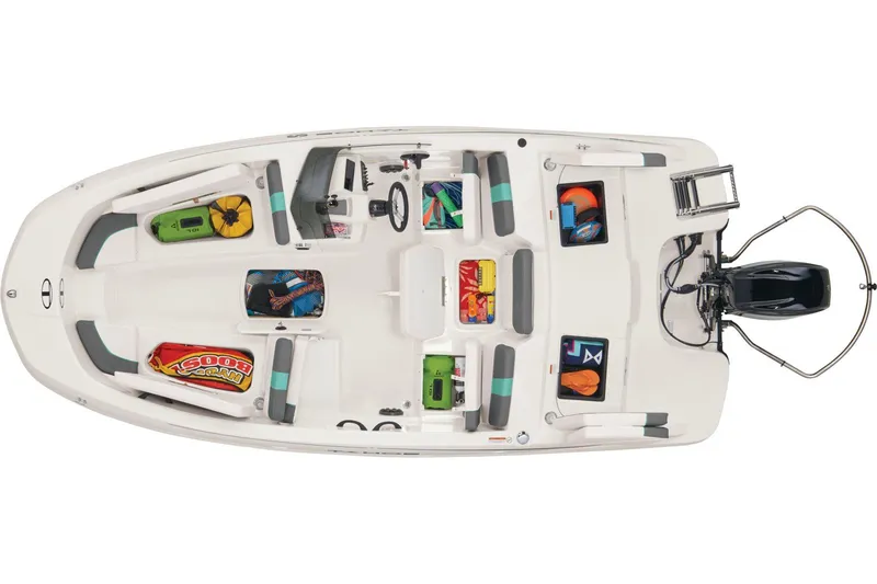 Slide: The Image of 2025 Tahoe T16 boat with red canopy and outboard motor, parked on pavement. - 3