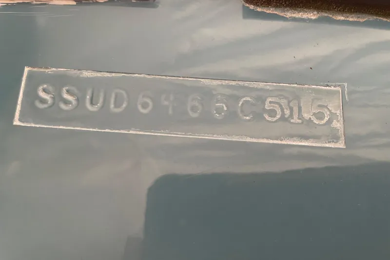 Slide: The Image of Hull identification number on a 2015 Pursuit DC 265 Dual Console boat. - 19