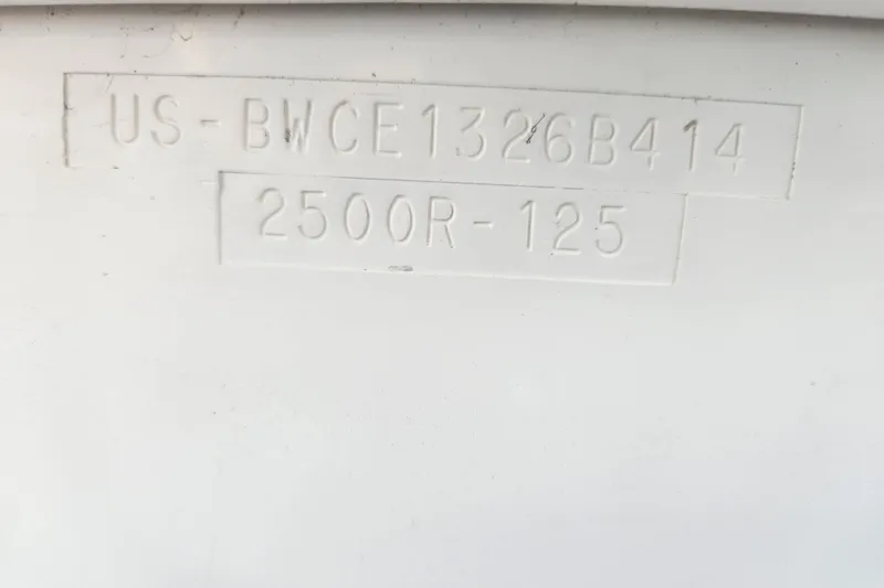 Slide: The Image of Hull identification number on 2014 Boston Whaler 250 Outrage boat. - 15