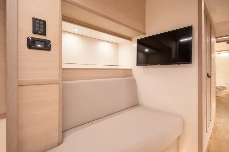 Slide: The Image of Modern interior of 2026 Knysna 550 yacht with sofa and wall-mounted TV. - 3