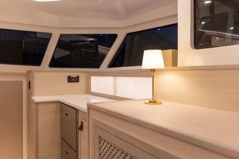 Slide: The Image of Luxurious interior of 2026 Knysna 550 yacht with elegant lighting and modern design. - 5