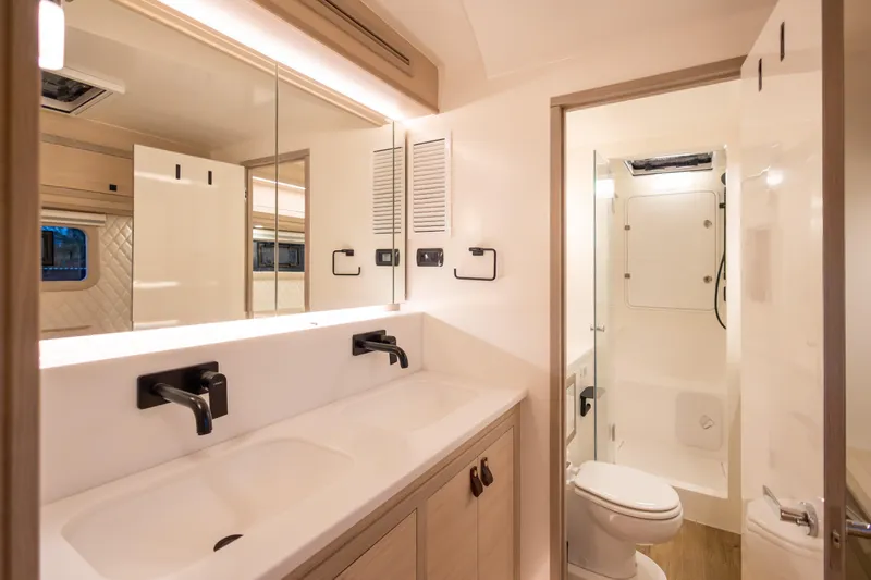 Slide: The Image of Luxurious bathroom interior of 2026 Knysna 550 with dual sinks and modern fixtures. - 2