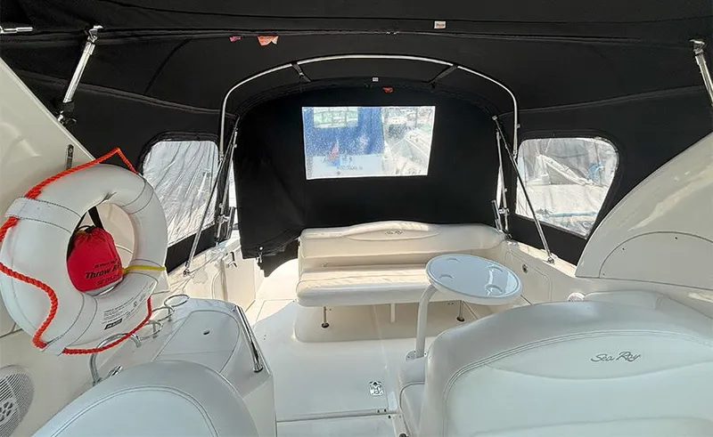 Slide: The Image of 2007 Sea Ray 280 Sundancer interior with seating, table, and life preserver. - 5