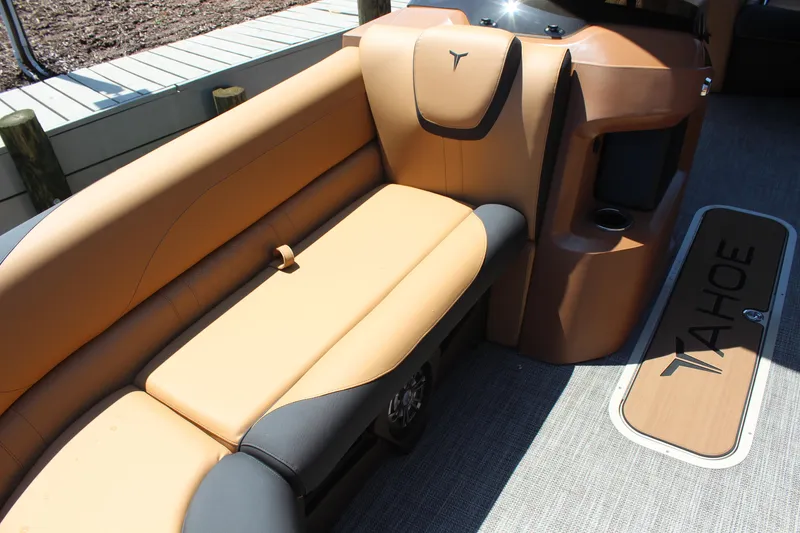 Slide: The Image of 2025 Tahoe Pontoon LTZ Versatile Rear Lounger with tan seating and sleek design. - 10
