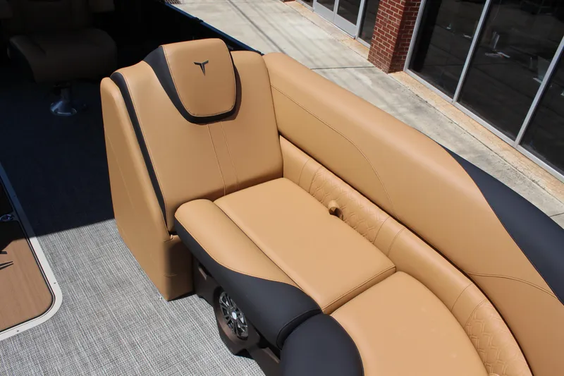 Slide: The Image of 2025 Tahoe Pontoon LTZ Versatile Rear Lounger with tan and black seating. - 9
