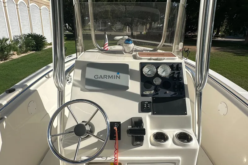 Slide: The Image of 2019 Bulls Bay 230 Center Console boat dashboard with Garmin navigation system. - 9
