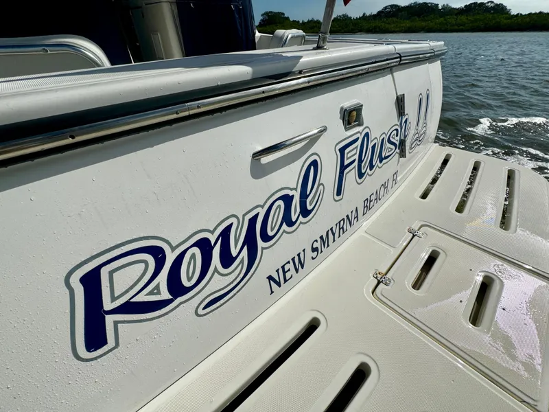 Slide: The Image of 2006 Tiara Yachts 3200 Open, "Royal Flush," New Smyrna Beach, FL, docked by water. - 20