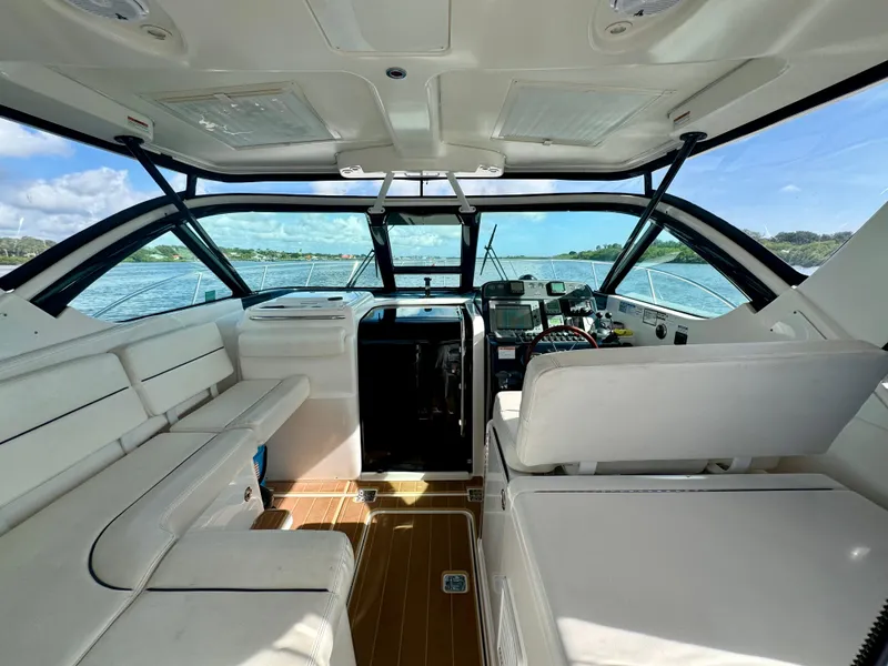 Slide: The Image of 2006 Tiara Yachts 3200 Open interior with helm, seating, and water view. - 21