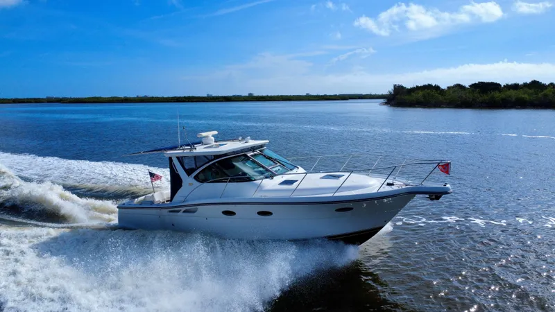 Slide: The Image of 2006 Tiara Yachts 3200 Open cruising on a sunny day. - 4