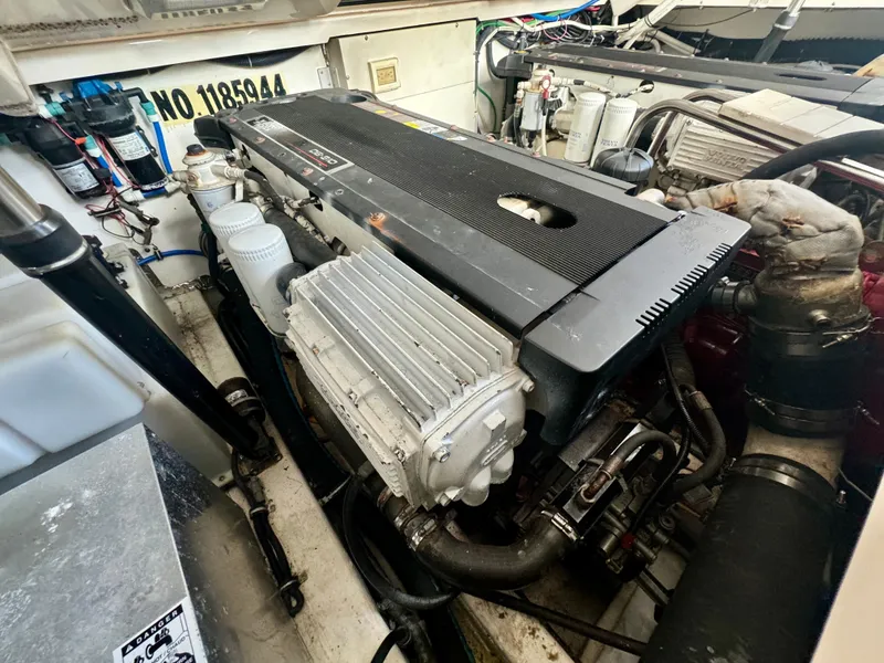 Slide: The Image of Engine compartment of a 2006 Tiara Yachts 3200 Open, showcasing mechanical components. - 48