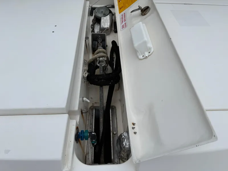 Slide: The Image of Leopard 48 yacht ceiling view with metal supports and teal accents, 2013 model. - 13