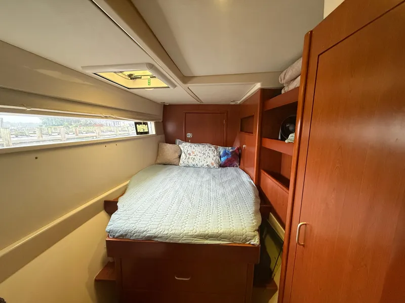 Slide: The Image of Luxurious bathroom in a 2013 Leopard 48 yacht with modern fixtures and shower. - 46