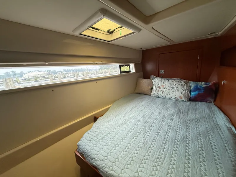 Slide: The Image of Electrical control panel inside a 2013 Leopard 48 yacht, featuring switches and meters. - 48