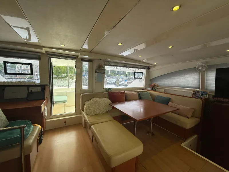 Slide: The Image of Interior of 2013 Leopard 48 yacht with dining area and sea view. - 57