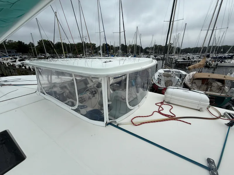 Slide: The Image of Control panel of a 2013 Leopard 48 yacht featuring Garmin navigation equipment. - 77