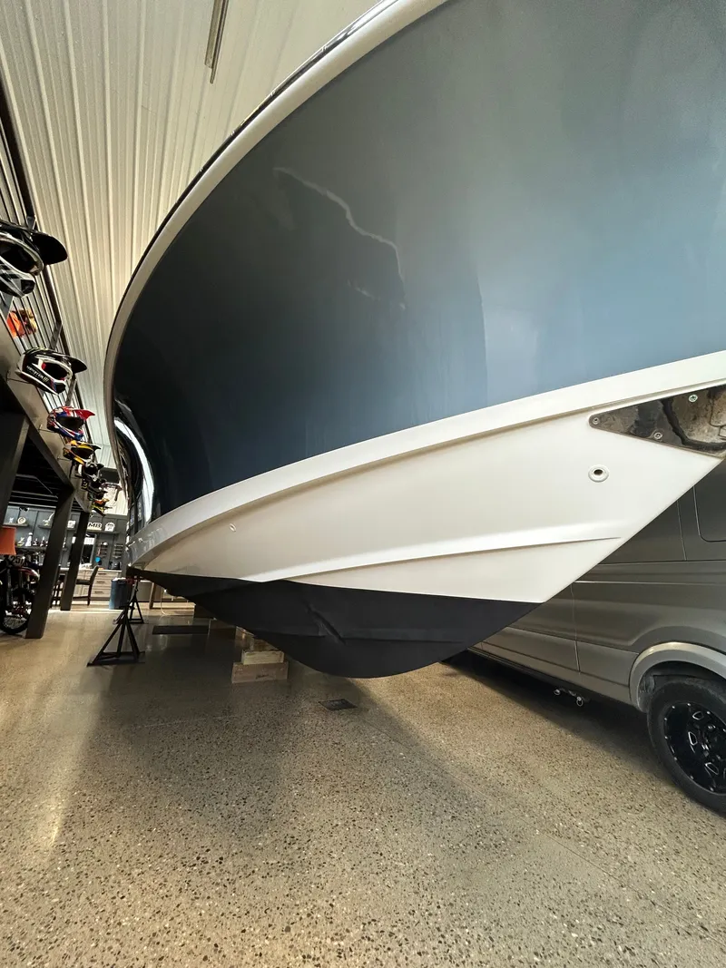 Slide: The Image of 2019 Boston Whaler 380 Outrage displayed indoors. - 48