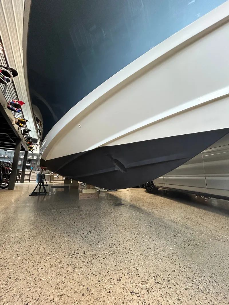 Slide: The Image of Boston Whaler 380 Outrage 2019 displayed indoors on stands. - 51