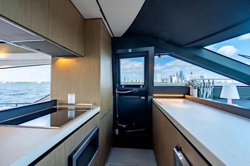 Slide: The Image of Luxurious interior of 2024 Ferretti Yachts 720 with city skyline view. - 41