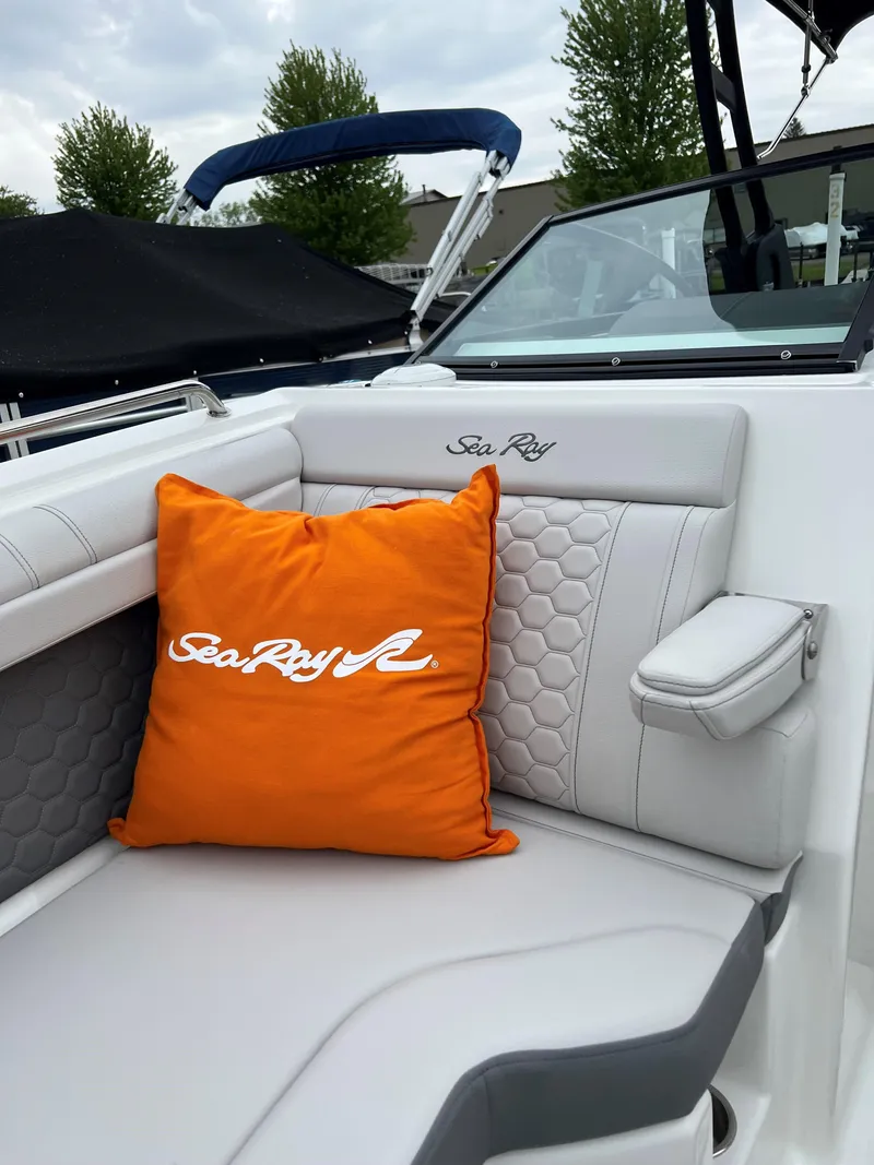 Slide: The Image of 2023 Sea Ray SDX 290 Outboard boat on a sunny lake day. - 2